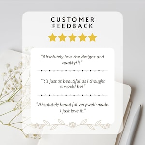 May include: A white card with customer feedback, gold stars, and text. The text includes phrases like "Absolutely love the designs and quality!!!" and "Absolutely beautiful very well-made. I just love it."