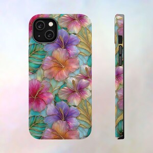 May include: A smartphone case featuring a vibrant floral pattern of hibiscus flowers in shades of pink, purple, and orange, accented with green leaves and gold outlines. The design covers the back and side edges, showing the camera lens cutout.