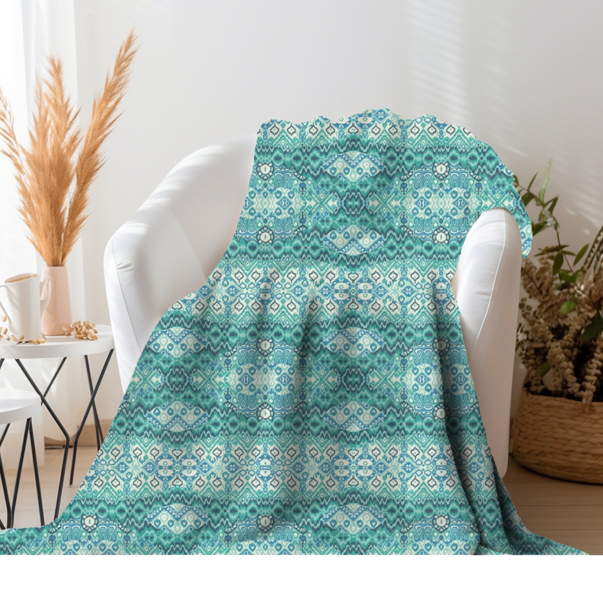 Turquoise throw blanket and pillows top