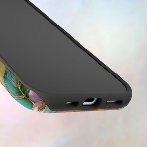 May include: A black smartphone case with a matte finish and a bottom edge featuring cutouts for a charging port and speakers. The back of the case displays a vibrant pattern of teal, purple, and gold veins resembling polished marble stone.