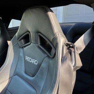 thumbnail interactive-video image 1 of Alloy Seat Belt Guide Holder For Mercedes Benz W113 SL Pagoda – Left & Right 1 of 2