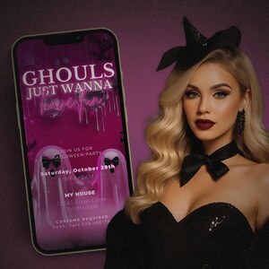 Fashion-forward woman with long wavy blonde hair, a black bow headband, and dark glam makeup poses beside a phone mockup of the pink Halloween invitation. Deep plum background adds drama while reinforcing the luxe, spooky-chic tone of the product. Highlights the style and vibe of the invite design—perfect for bachelorette parties and girls’ nights with glam Halloween themes.