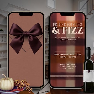May include: Two smartphones display a Friendsgiving invitation with a burgundy bow and the text "Friendsgiving & Fizz." A bottle of wine and a small pumpkin are also visible. The invitation includes date, time, and location details.