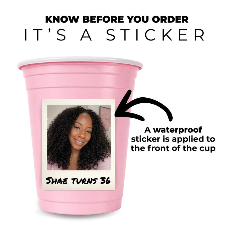 Pink 16 oz personalized photo party cup with custom “Shae Turns 36” Polaroid-style sticker and notice that a waterproof sticker is applied to the front.