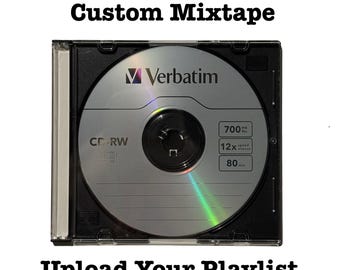 May include: A CD-RW disc in a black case with the text "Verbatim" and "700 MB". The text "RUSH ORDER Custom Mixtape" is above the disc, and "Upload Your Playlist" is below.