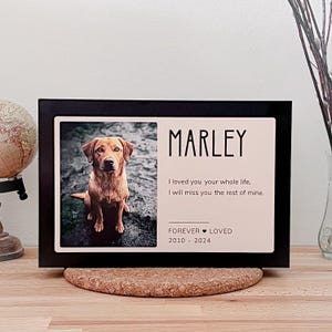 May include: Black wooden plaque with a photo of a brown dog and the text "MARLEY", "I loved you your whole life, I will miss you the rest of mine." and "FOREVER LOVED 2010 - 2024".