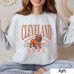 Sudadera de fútbol americano de Cleveland, cuello redondo vintage para el día del partido, ropa unisex para fanáticos, sudadera con capucha Dawg Pound, regalo de moda, sudadera deportiva retro