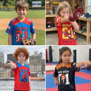 May include: Four children in Marvel superhero jerseys. The jerseys display Captain America, Iron Man, Spider-Man, and Black Widow graphics. Each jersey has the number "01" and character-specific designs. The children are in different locations, including a baseball field and a training area.