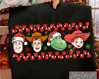 May include: Black Christmas-themed graphic featuring cartoon characters wearing Santa hats. The design includes the text "New Design Sublimation Design High Resolution 300Dpi". The characters are arranged above a string of lights.