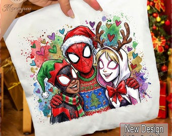 May include: White pillow featuring a colorful illustration of three Spider-Man characters in festive attire. The design includes a Santa hat, reindeer antlers, and a Christmas sweater. The background has hearts and paint splatters. Text on the pillow reads "Spider-Man".