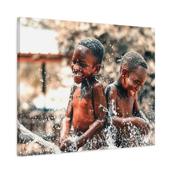 Matte canvas printed with African children playing in the water.