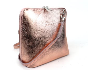 ピンクゴールドのレザートートバッグ。本革のショッパー。ノート