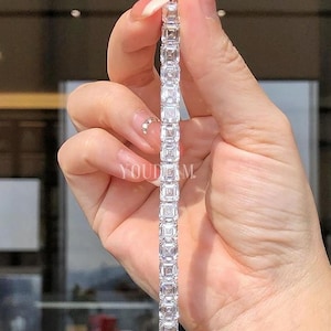 Tennisarmband met Asscher-geslepen laboratoriumdiamanten (28 karaat) in 925/935 zilver en massief goud.