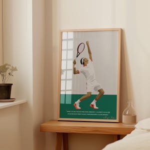 May include: A framed art print featuring a tennis player in action, rendered in a minimalist style. The artwork depicts a player in a white uniform with a red tennis racket. The print includes a quote by Roger Federer.