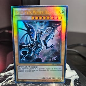 Drago Bianco Occhi Blu (JMPS Art) - Ultra - Luce Stellare - Prismatico Raro Segreto - Comune - Singolo o Playset - Orica Proxy