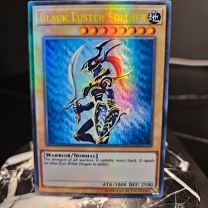 Soldado del Brillo Negro (Monstruo Normal) - Ultra Raro - Raro Luz Estelar del Cuarto de Siglo del 25.º Aniversario - Secreto Prismático - Proxy Orica - QCSR