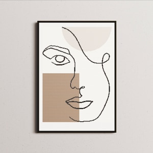 May include: A line drawing of a face with a brown rectangle behind it. The face is outlined in black and has a single eye, a nose, and a mouth. The background is a light beige color.