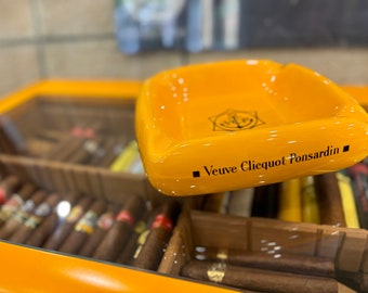 If you like cigars and Veuve clicquot champagne then we show you an interesting and rare object Orange CLICQUOT cigar ashtray Origin France