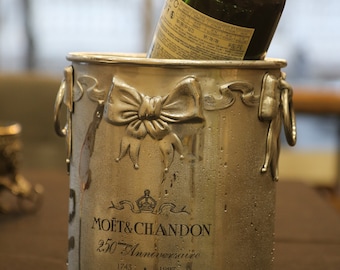 This ribbon-adorned Moët & Chandon ice bucket was released for the company's 250th anniversary in 1993