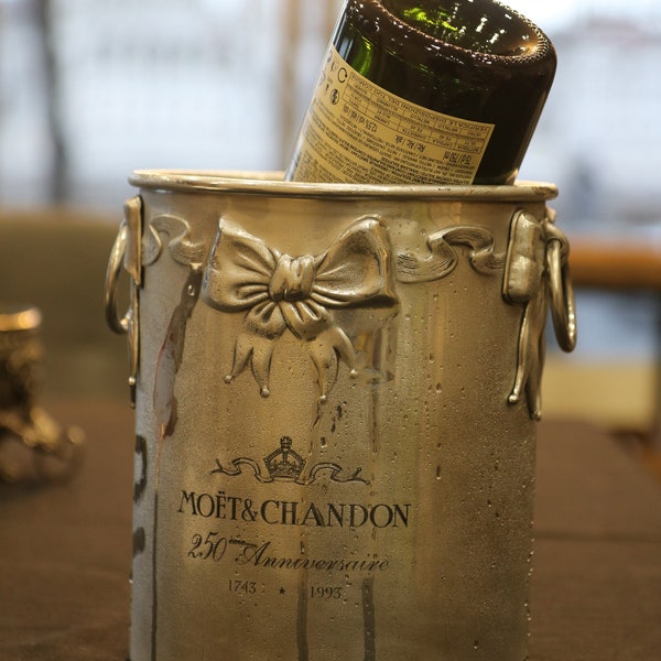 This ribbon-adorned Moët & Chandon ice bucket was released for the company's 250th anniversary in 1993