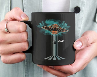 Taza de café con forma de gato abducido por extraterrestres, regalo para amantes de los ovnis, taza negra de 325 ml