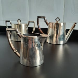 Service à thé et à café, Art déco du début du siècle, vers 1920, plaqué argent. Rares. MÈNÈS