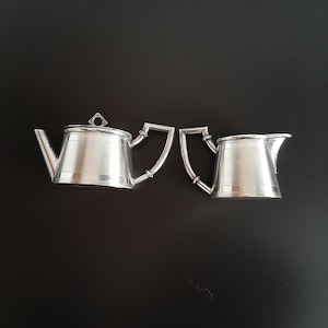 Service à thé et à café art déco, début du siècle, art déco vers les années 1920 plaqué argent. Rares. MÈNÈS