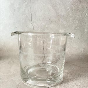 Elegant glass ice bucket with a delicate etched pattern, made in France