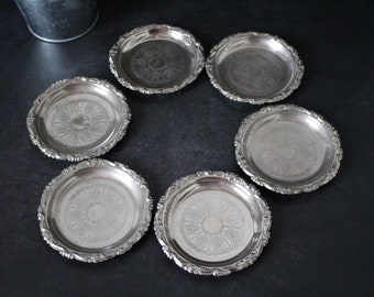 Six Silver plated saucers, EP on steel, made in Italy