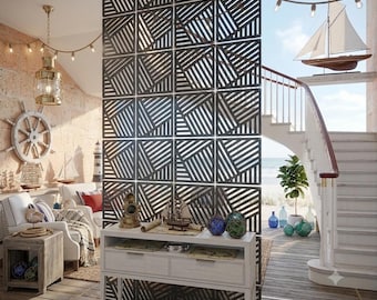 May include: A dark gray room divider screen composed of a grid of square panels, each featuring a geometric pattern of diagonal slats. The screen stands upright, separating a living area from a staircase, with a white console table placed in front.