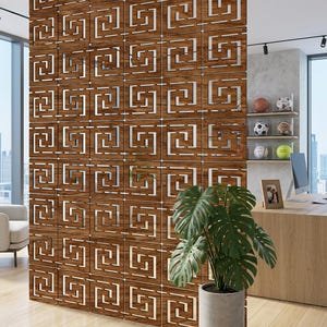 May include: A room divider screen composed of multiple square panels featuring a brown wood grain finish and a repeating geometric Greek key cutout pattern. The modular panels are connected to form a tall, vertical partition wall.