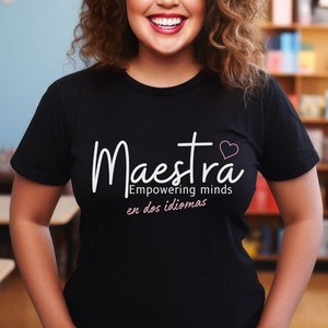 Woman wearing the design on a black shirt.