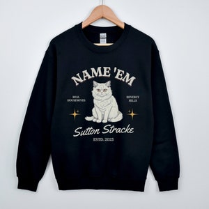 Name 'Em Sutton RHOBH Cat Unisex Crewneck Sweatshirt, Real Housewives of Beverly Hills, Sutton Stracke, Bravo TV Gifts, Kyle Richards, Erika