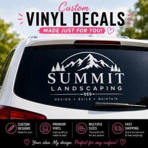 May include: A white vinyl decal applied to a car rear window featuring a mountain range graphic above the text SUMMIT LANDSCAPING, with the words DESIGN, BUILD, MAINTAIN below. The decal includes pine tree silhouettes and a decorative flourish.