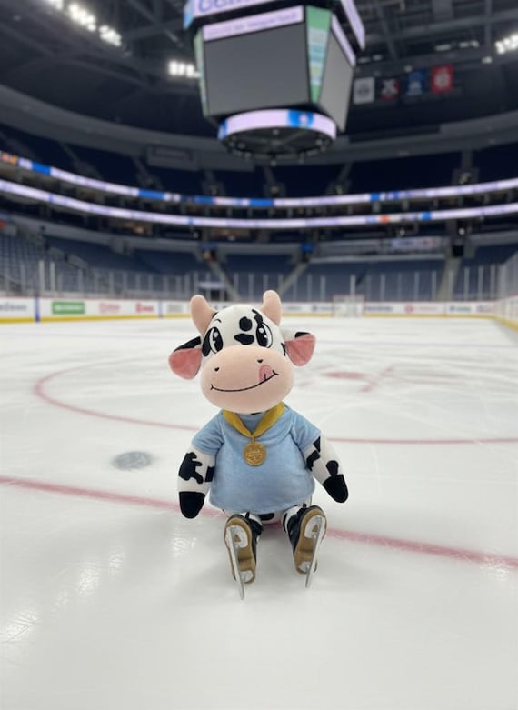 Plush Salchow Cow: Figure Skating Superstar with Gold Medal