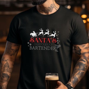 Santa&#39;s Favorite Bartender Shirt: Holiday Martini Graphic Tee