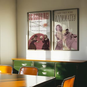 A framed print with two ladies in a romantic pose, with the text 'and they were roommates'.