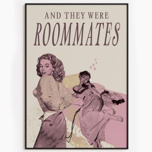 A framed print with two ladies in a romantic pose, with the text 'and they were roommates'.