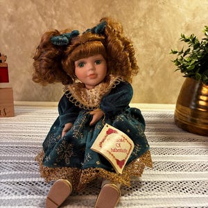Vintage the Collector's Choice Series by Dandy Porcelain Doll With Green Velvet Dress 12 In