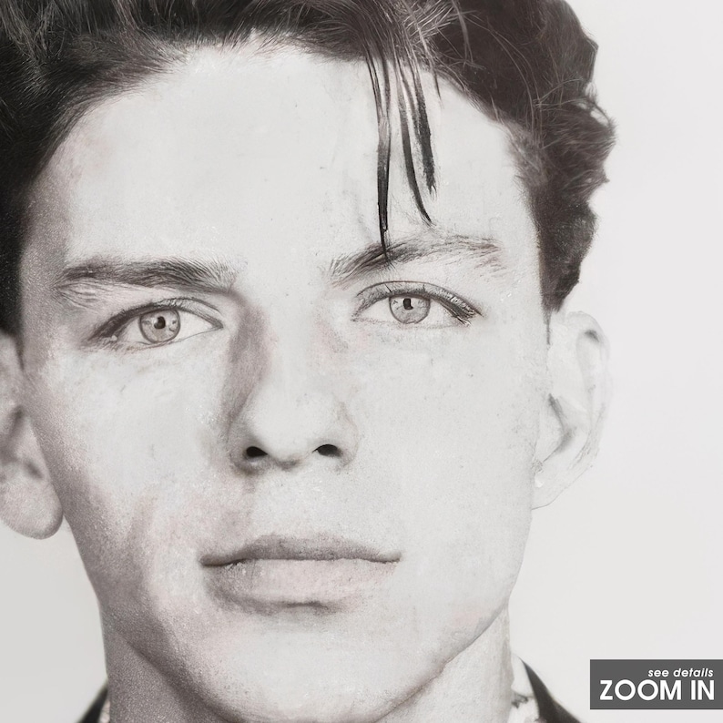May include: Black and white portrait photograph of a young man with dark hair styled in a side part. He is looking directly at the camera with a serious expression.