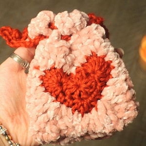 Crochet heart earbud pouch, soft pink drawstring pouch