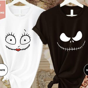 a t - shirt with a face drawn on it