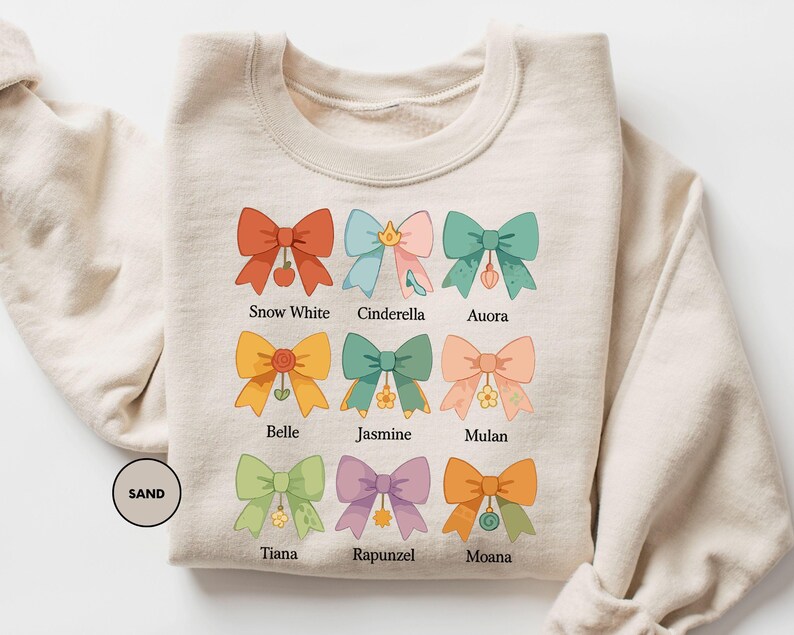 a white shirt with a bunch of bows on it