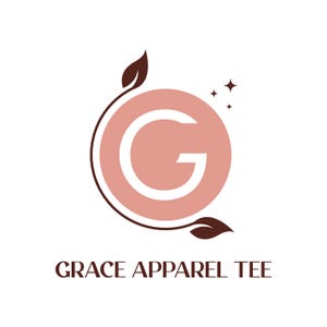 May include: A pink circle with a white letter G inside, surrounded by brown leaves and two small white stars. The text "GRACE APPAREL TEE" is below the circle.