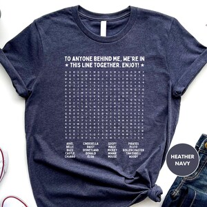 a t - shirt that says to anyone behind me we're in this line