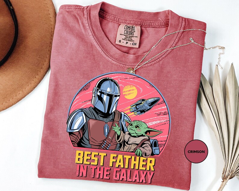 a t - shirt with a picture of a man in a helmet on it