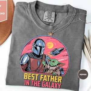 a t - shirt with a picture of a star wars character on it