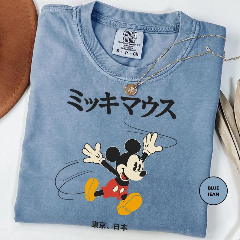 a mickey mouse tshirt is on a table