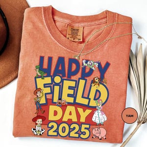 a t - shirt that says happy field day on it