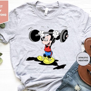 a mickey mouse t - shirt with a dumb dumb dumb dumb dumb dumb dumb dumb